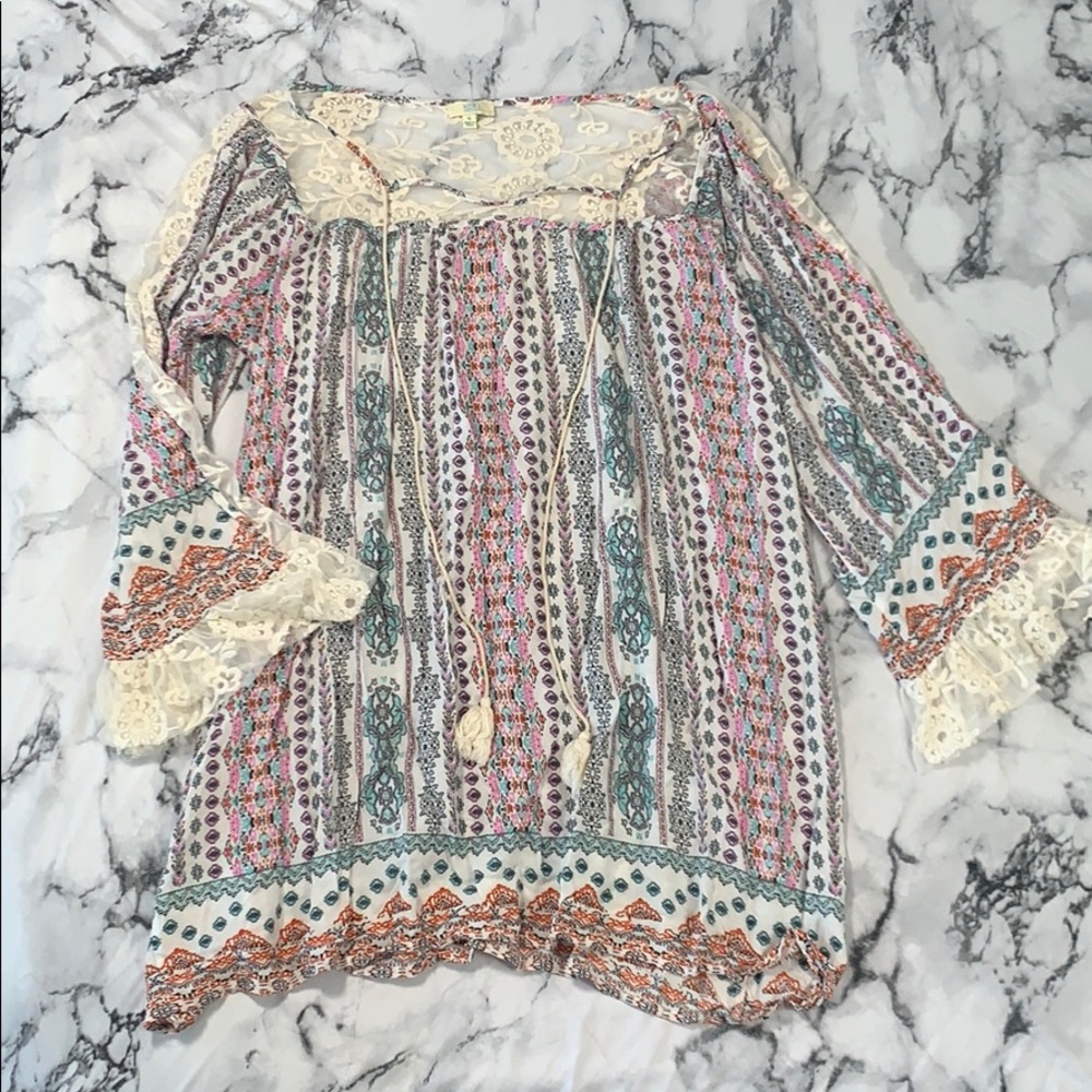 long colorful top with sheer sleeves and top